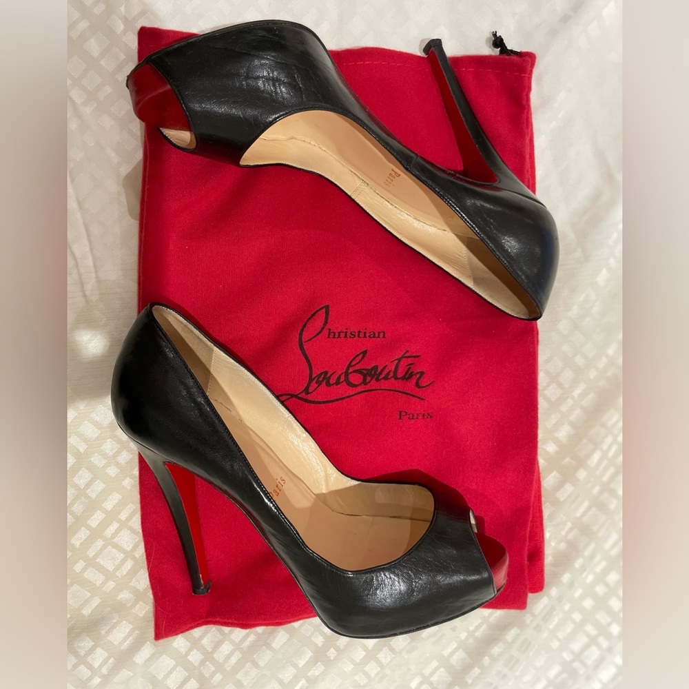 Authentic Christian Louboutin Open toe pumps , Used